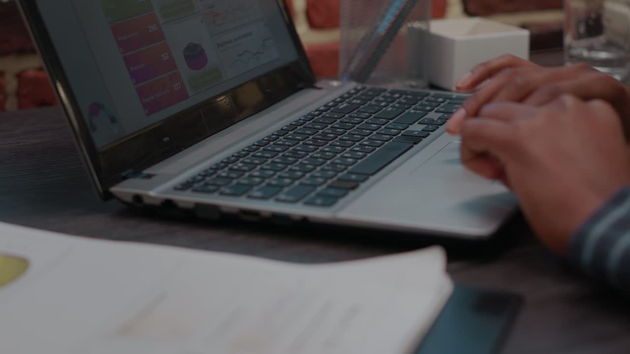 Office worker using laptop to work on company innovation