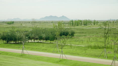 saemangeum environment ecological complex national park with wetlants and tourist walking trails - aerial panning