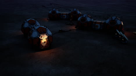 mars colony base illuminated at night showcasing structures and environment