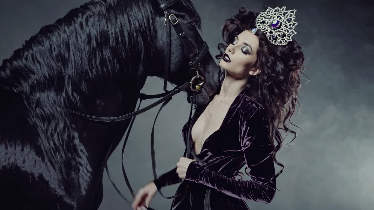 Woman in a Purple Velvet Dress with a Black Horse
