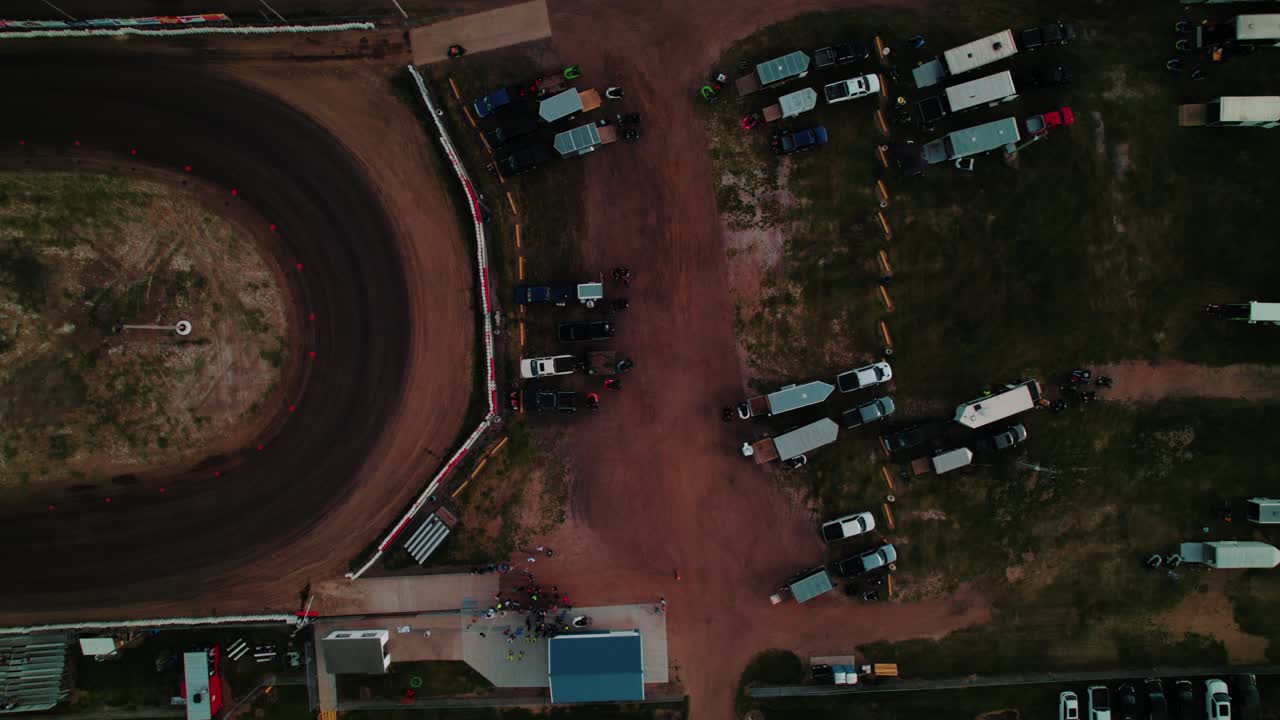 Top-down drone view of a dirt oval, home to local go-kart racing. A symbol of grassroots motorsports and American rural entertainment