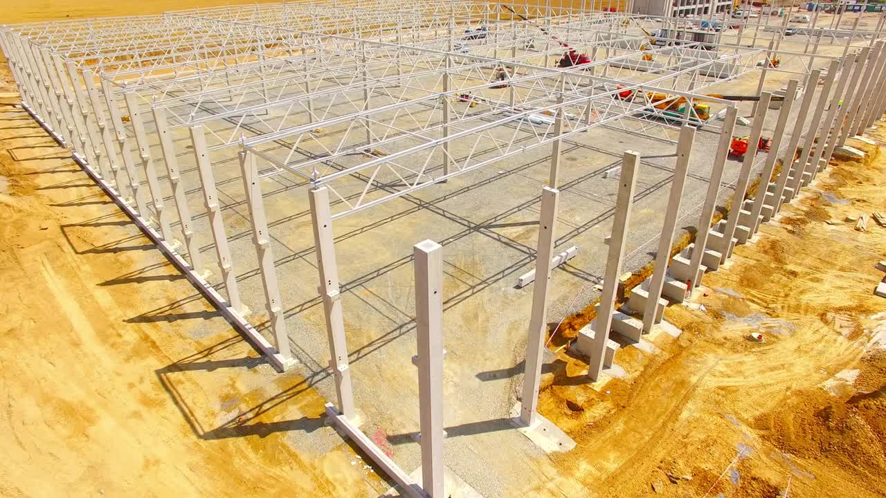 Aerial view of construction site. Industrial theme from drone. Industry, development and investment in European Union.