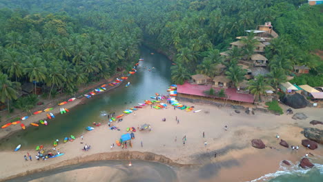 aerial view of tropical cola beach with kayaks and people goa india