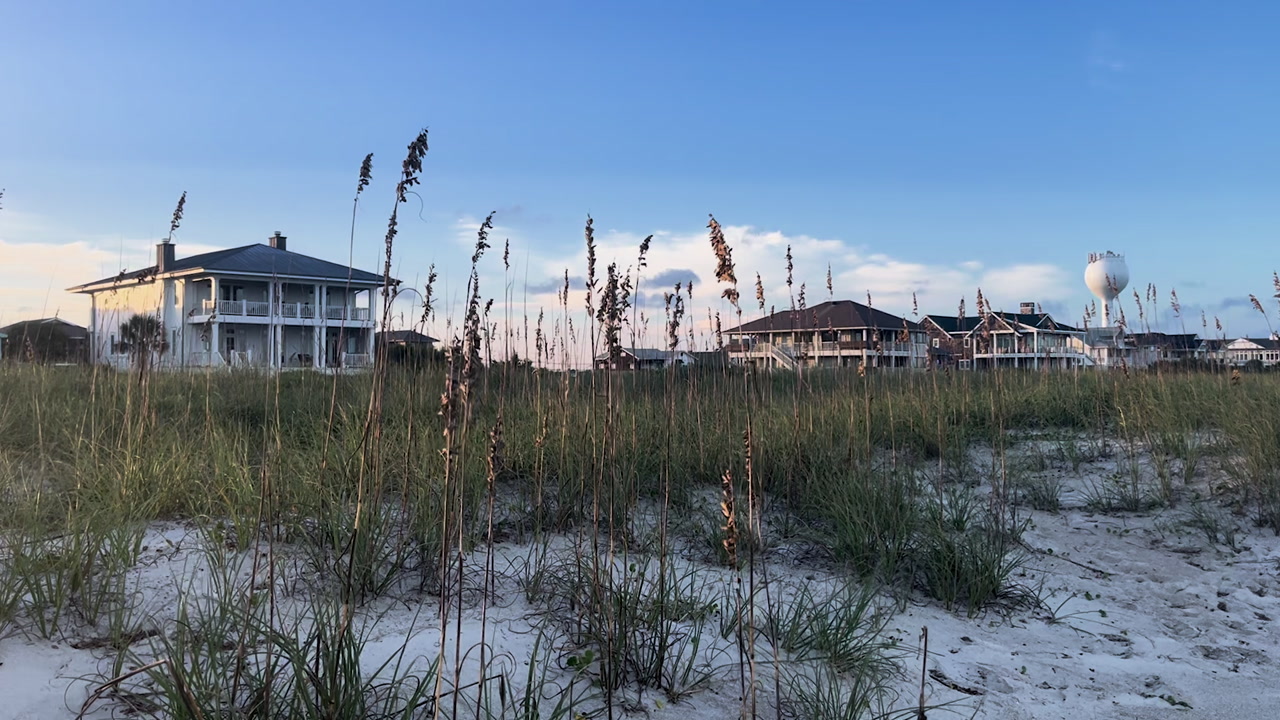 Beach Houses in Wilmington, NC at Sunset, with Sandy Dunes and Grass