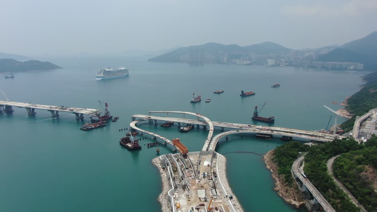 proyecto de construcción del enlace cruzado de la bahía de hong kong, un puente doble de dos carriles que conecta el túnel tseung kwan o lam tin con la carretera wan po, vista aérea