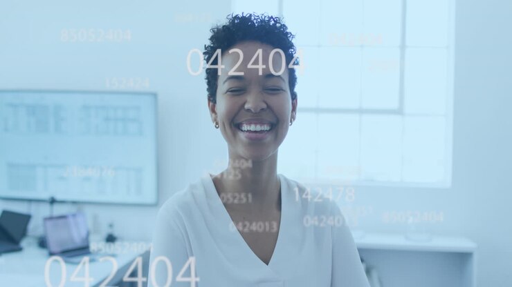 Animation of multiple changing numbers against portrait of african american woman smiling at office