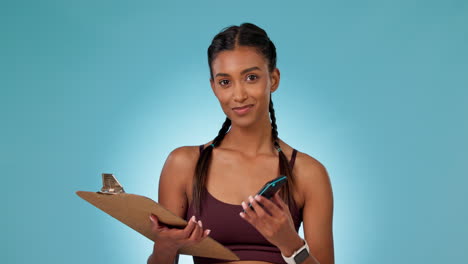 Woman,-machine-and-smile-in-studio-for-payment