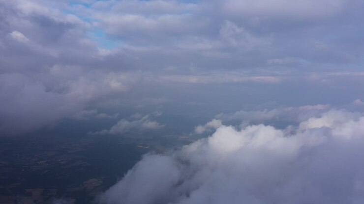 Aerial shot above clouds Pic Saint Loup summit mystic shot France