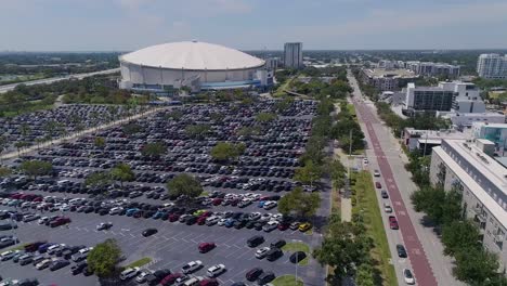 4k aerial drone video of tropicana field and full parking lots in downtown st