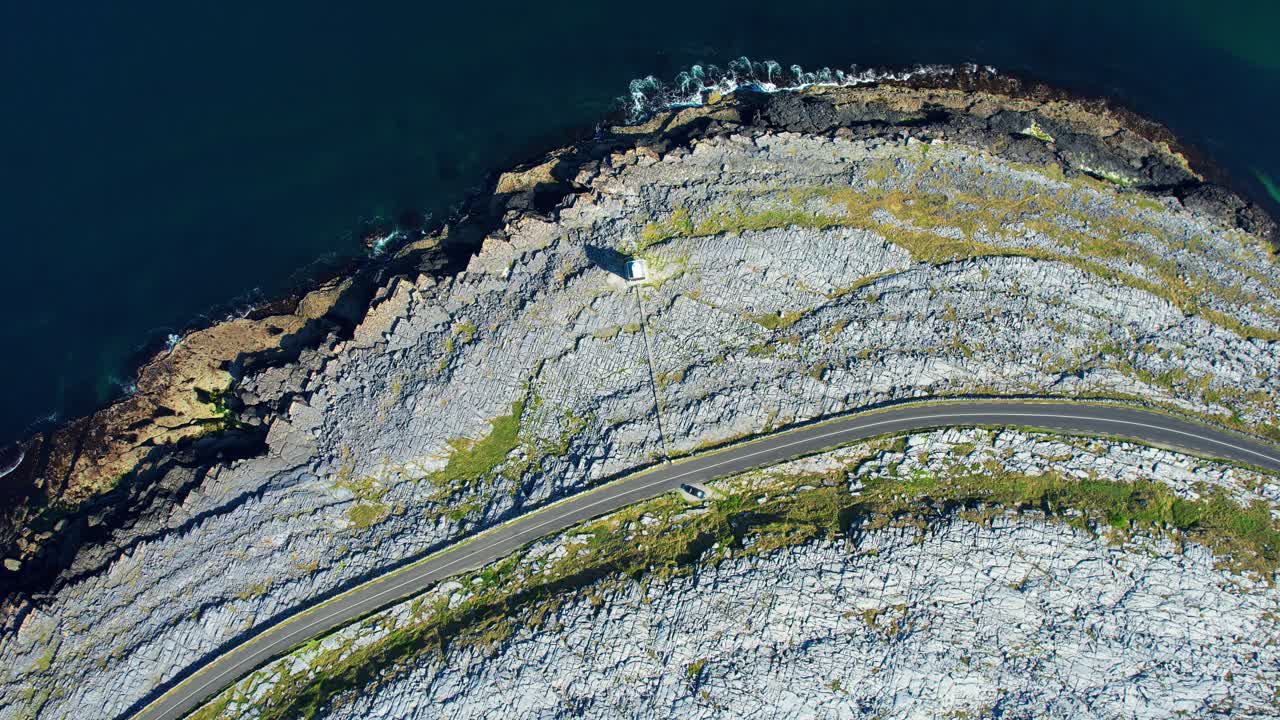 wild Atlantic Way black Head lighthouse aerial view of limestone landscape and Atlantic seas