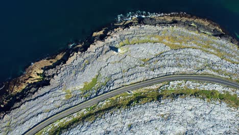 wild atlantic way black head lighthouse aerial view of limestone landscape and atlantic seas