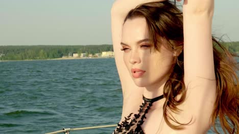 beautiful woman posing on a yacht