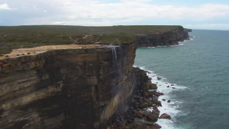 gorgeous waterfall scenery of cliffs on australia's ocean coast, aerial