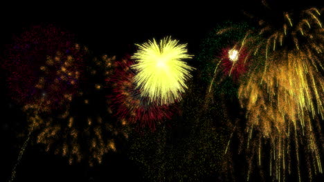 animación de coloridos fuegos artificiales de navidad y año nuevo que explotan en el cielo nocturno