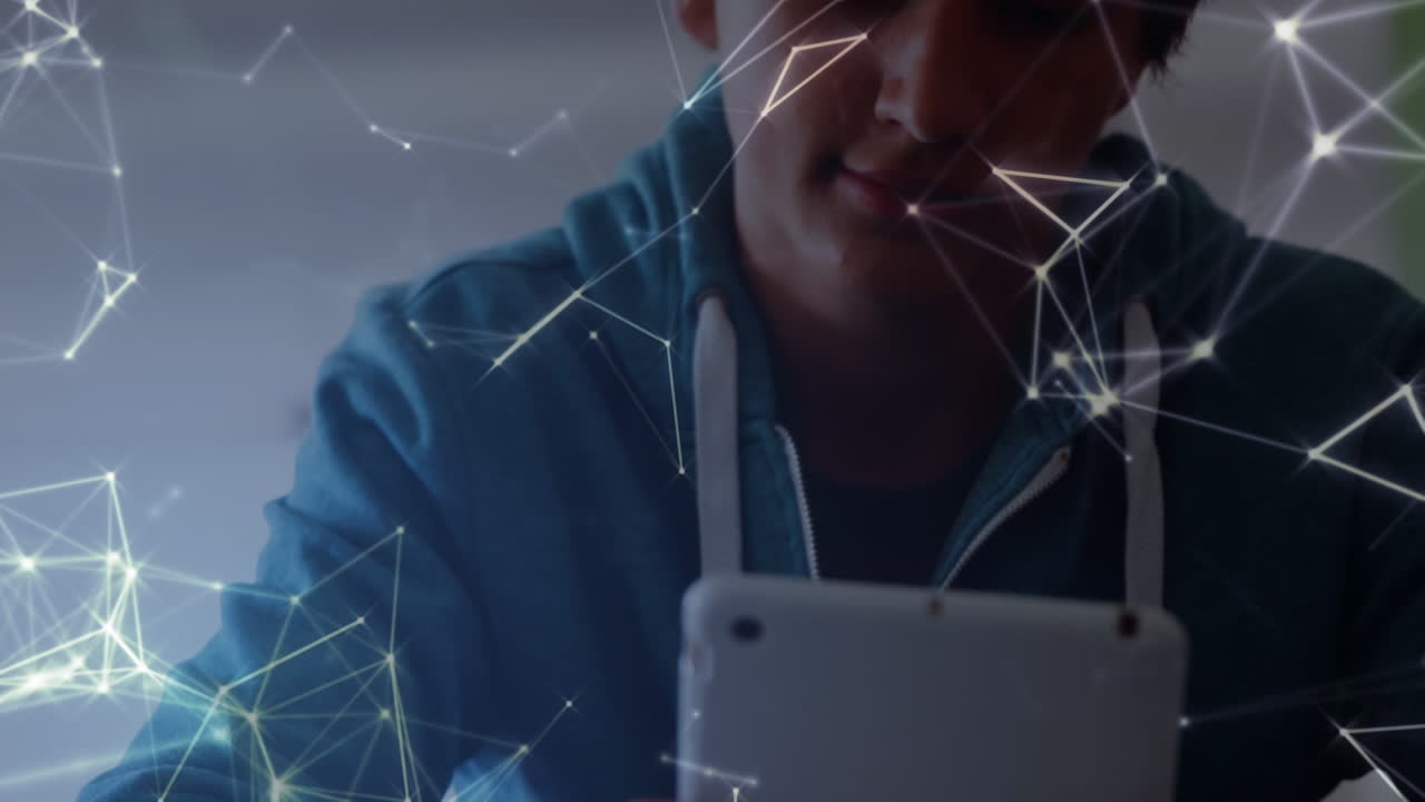 Animation of biracial male student using tablet over shapes