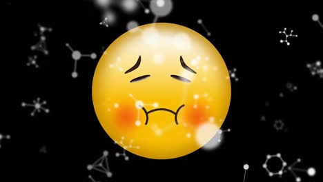 Digital-animation-of-molecular-structures-floating-over-sickface-emoji-against-black-background