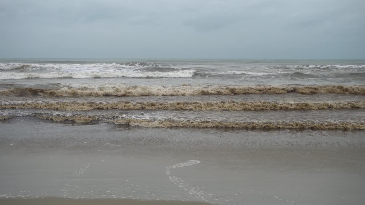 Very polluted water in ocean. Petrol oil and some trash