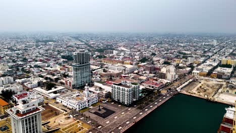 aerial view of coastal city with harbor