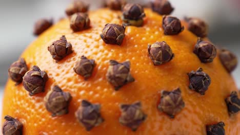 orange decorated with cloves