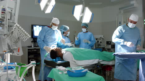 diverse team of surgeons operate in a hospital, with copy space