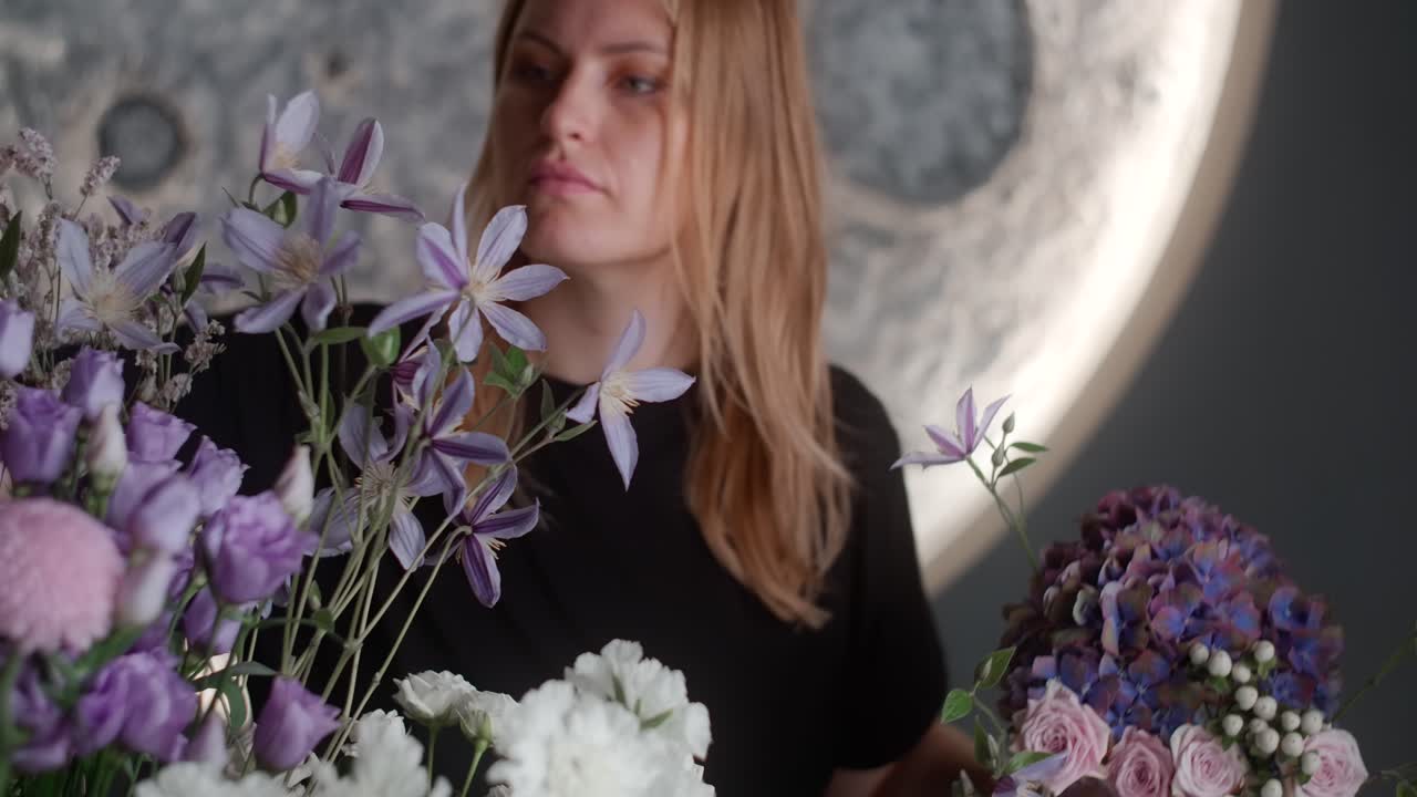 Florist Arranging Flowers in a Modern Setting