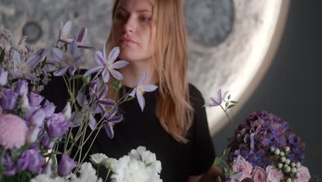florist arranging flowers in a modern setting