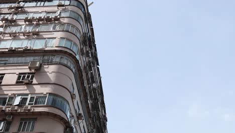 high-rise building with a visible cat cafe