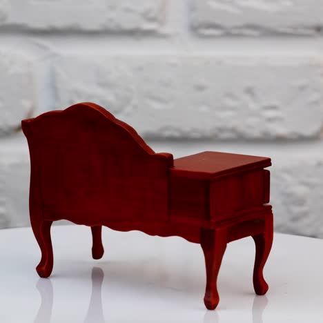 toy wooden furniture in studio. close up of wooden toy furniture rotation