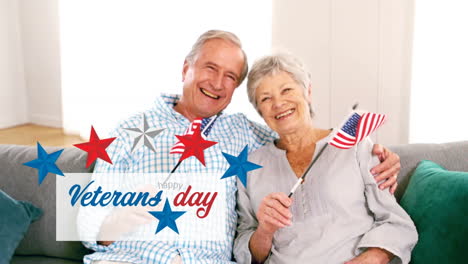 animation of veterans day text, stars over caucasian couple with flags of united states of america
