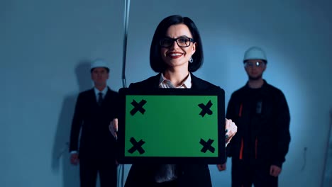 businesswoman with chromakey plate