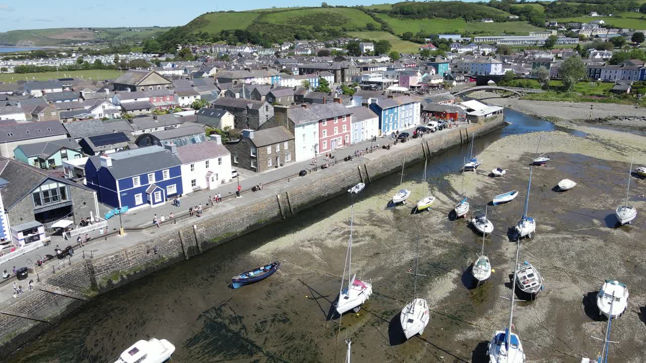 Quayside Aberaeron Wales seaside town and harbour Aerial footage 4k