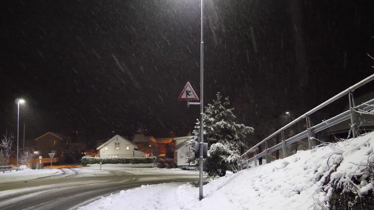 Sign in a town near the North Pole warning drivers of Santa nad Elf crossing