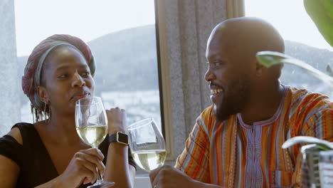 couple toasting champagne glasses in a comfortable home 4k