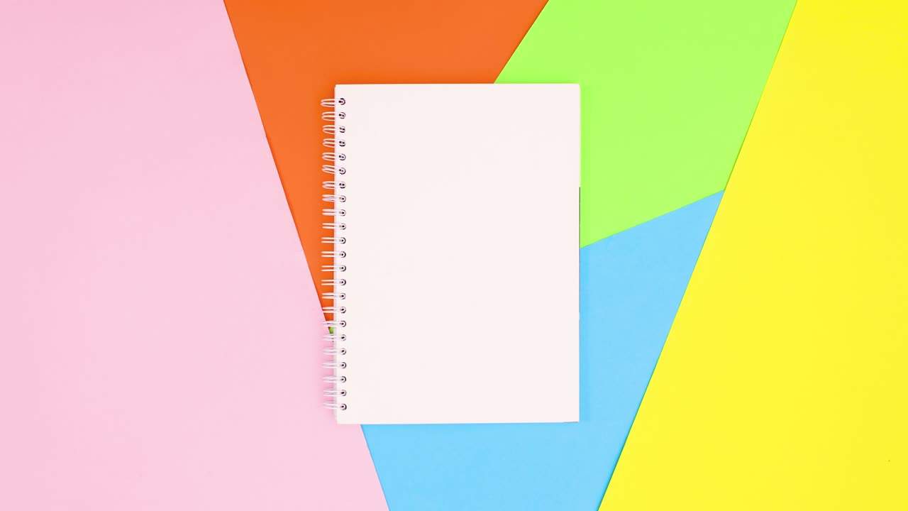 Colored pencils surrounding and back on colorful theme. Stop motion