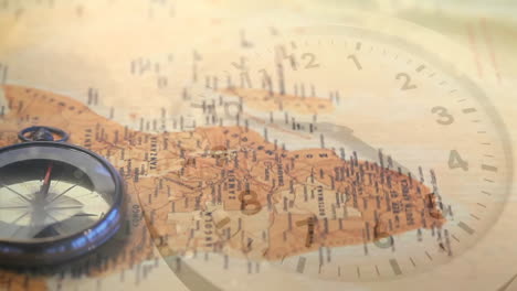 animation of clock moving over compass and map