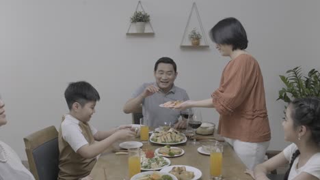 asian family having lunch.