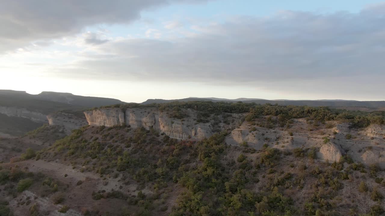 Picturesque view of rocky mountains under cloudy sky in Burgos, Spain