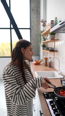 woman cooking in modern kitchen