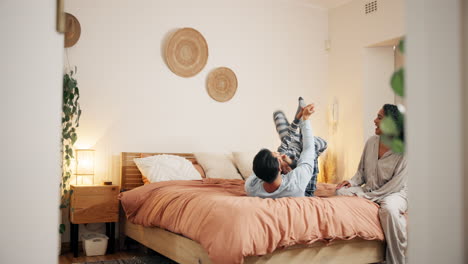 happy family playing in the bedroom