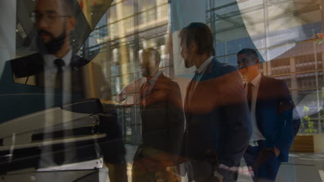 animation of men using computer over diverse group of business people