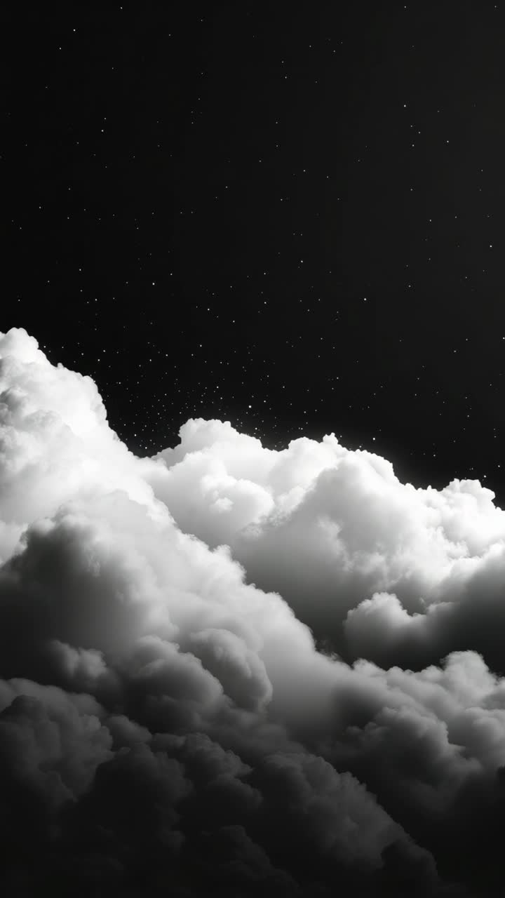 Dramatic low-angle shot of fluffy clouds against a starry night sky, creating a cinematic and dreamy