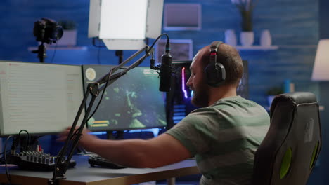 excited streamer with headphones winning important online esport competition