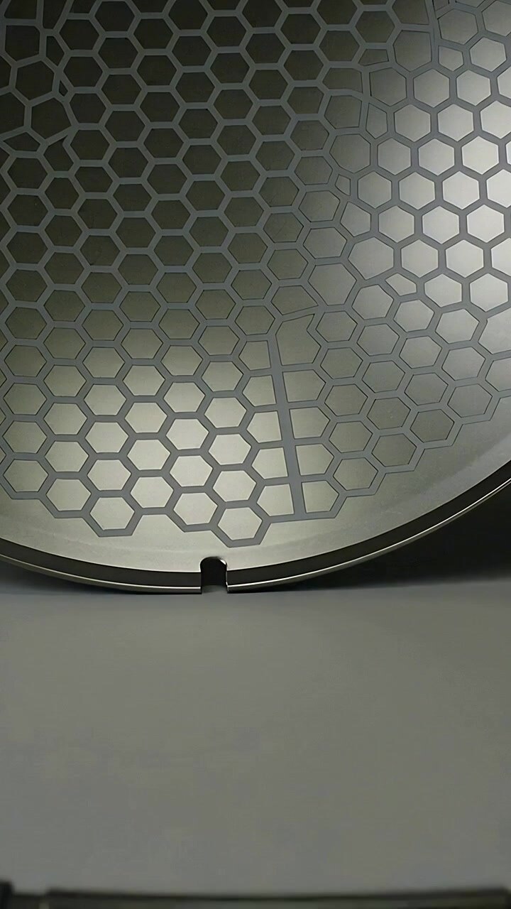 Vertical video: Panning view showing hex panel lowering to expose rim notch on desk