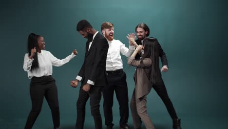 young guys in classic costumes celebrate the finishing successful work project