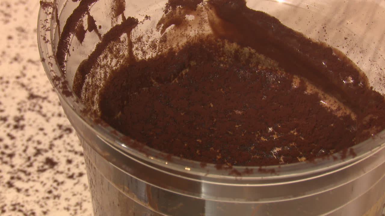 Preparing a Chocolate Drink in a Plastic Cup