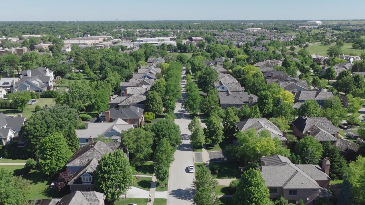 Glenview, Illinois, Glenview Illinois, suburban, neighborhood, aerial flyover, suburb, houses, homes, residential, tree lined street, street, trees, greenery, lawns, rooftops, roofs, gable roof, chimn