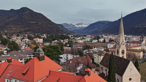 aerial view of city with majestic mountain backdrop