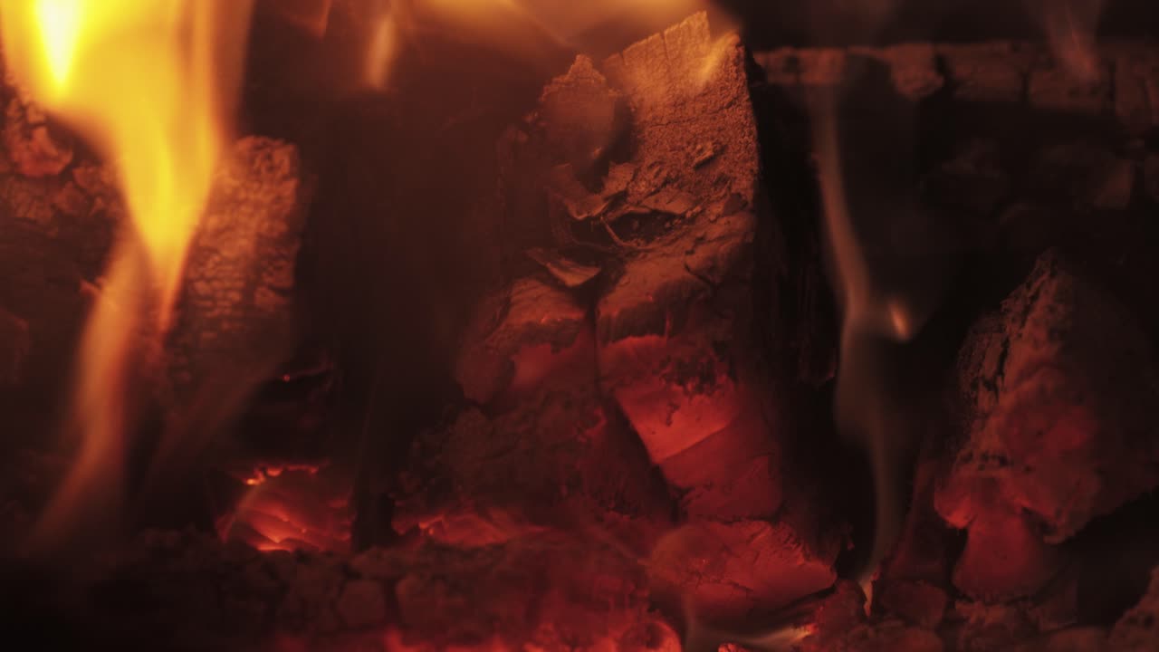 Indoor wood burner with a wet back used for heating both water and the house interior.