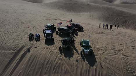 dune buggies driving down the glamis sand dunes