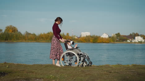 girl with disability plays game with virtual reality glasses